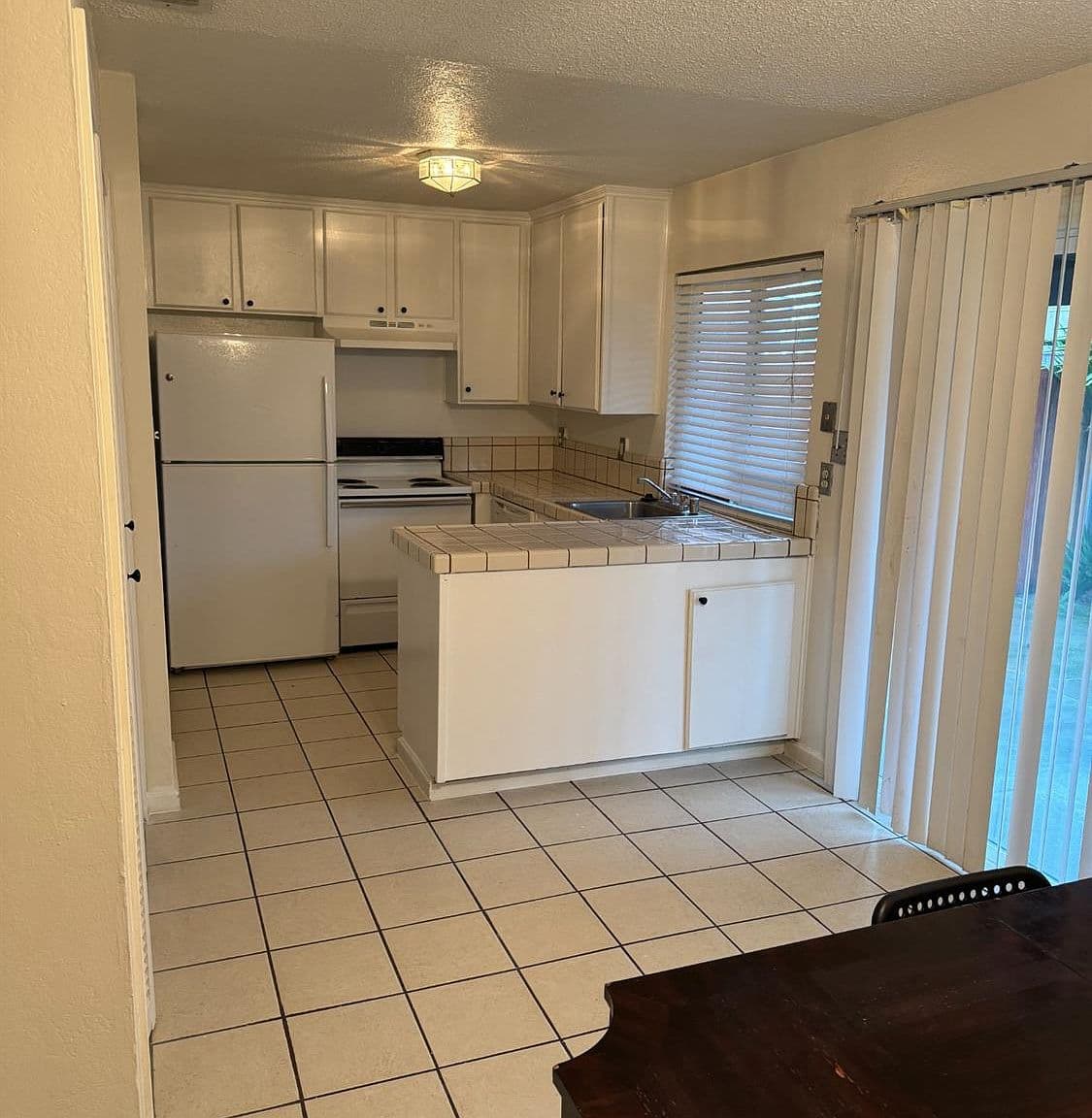 Outdated Tile Countertops and Backsplash