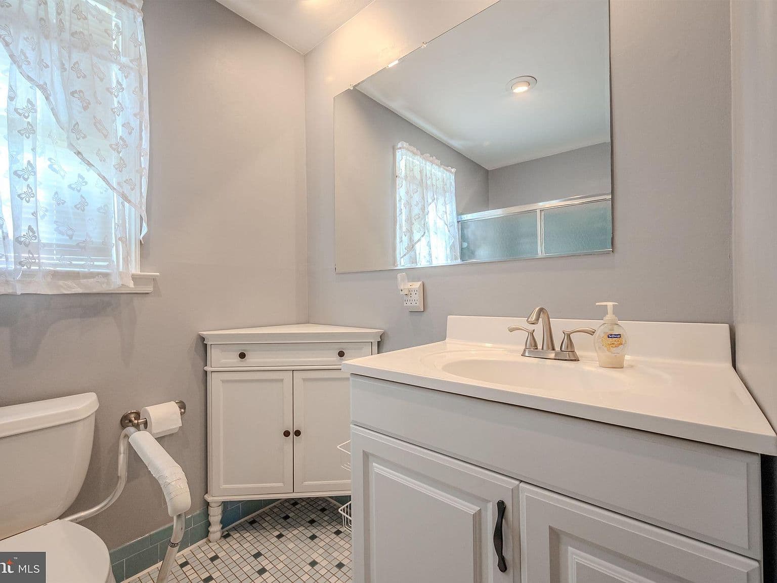 Outdated Bathroom Tile and Fixtures