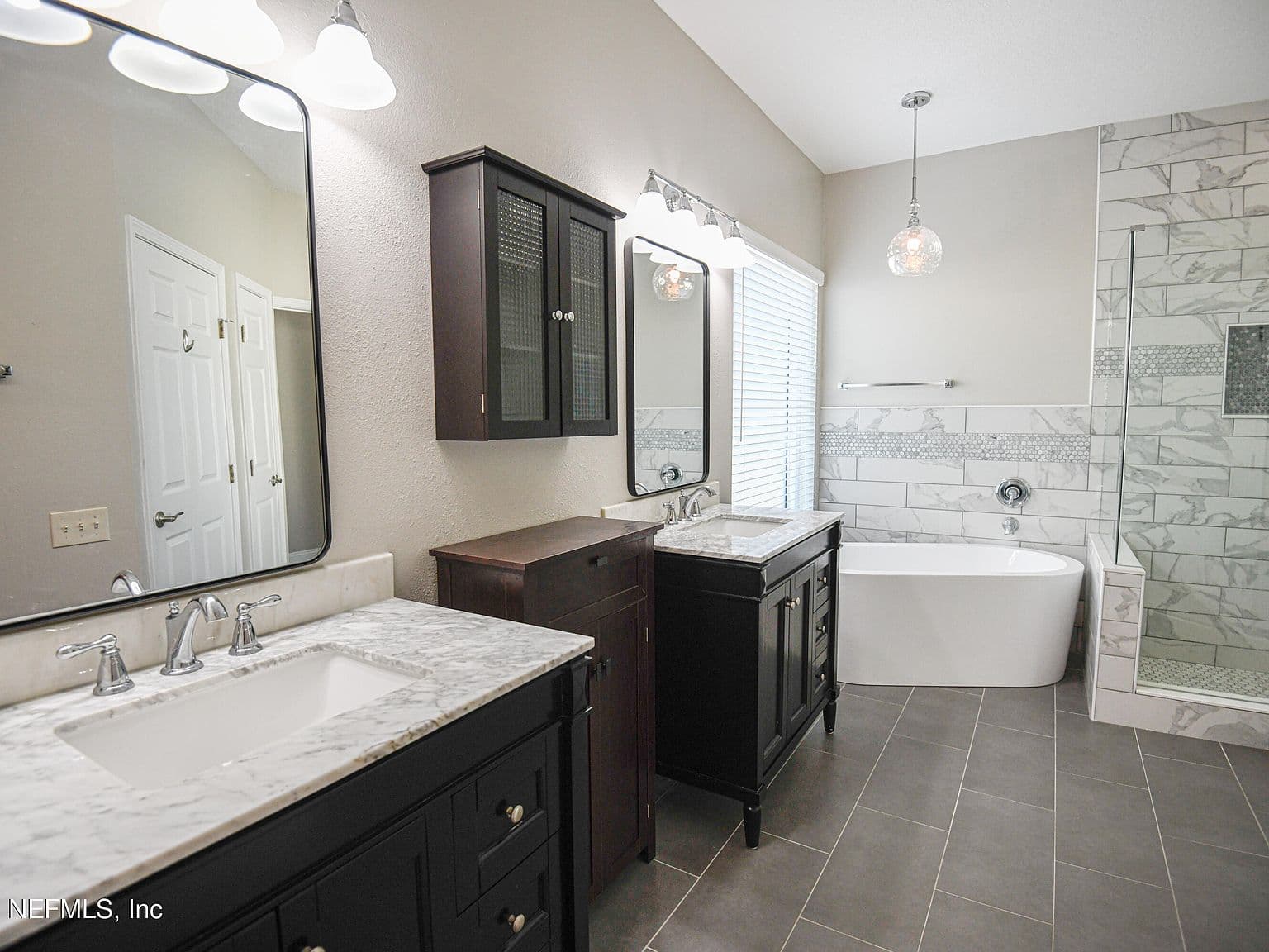Two separate vanities in bathroom