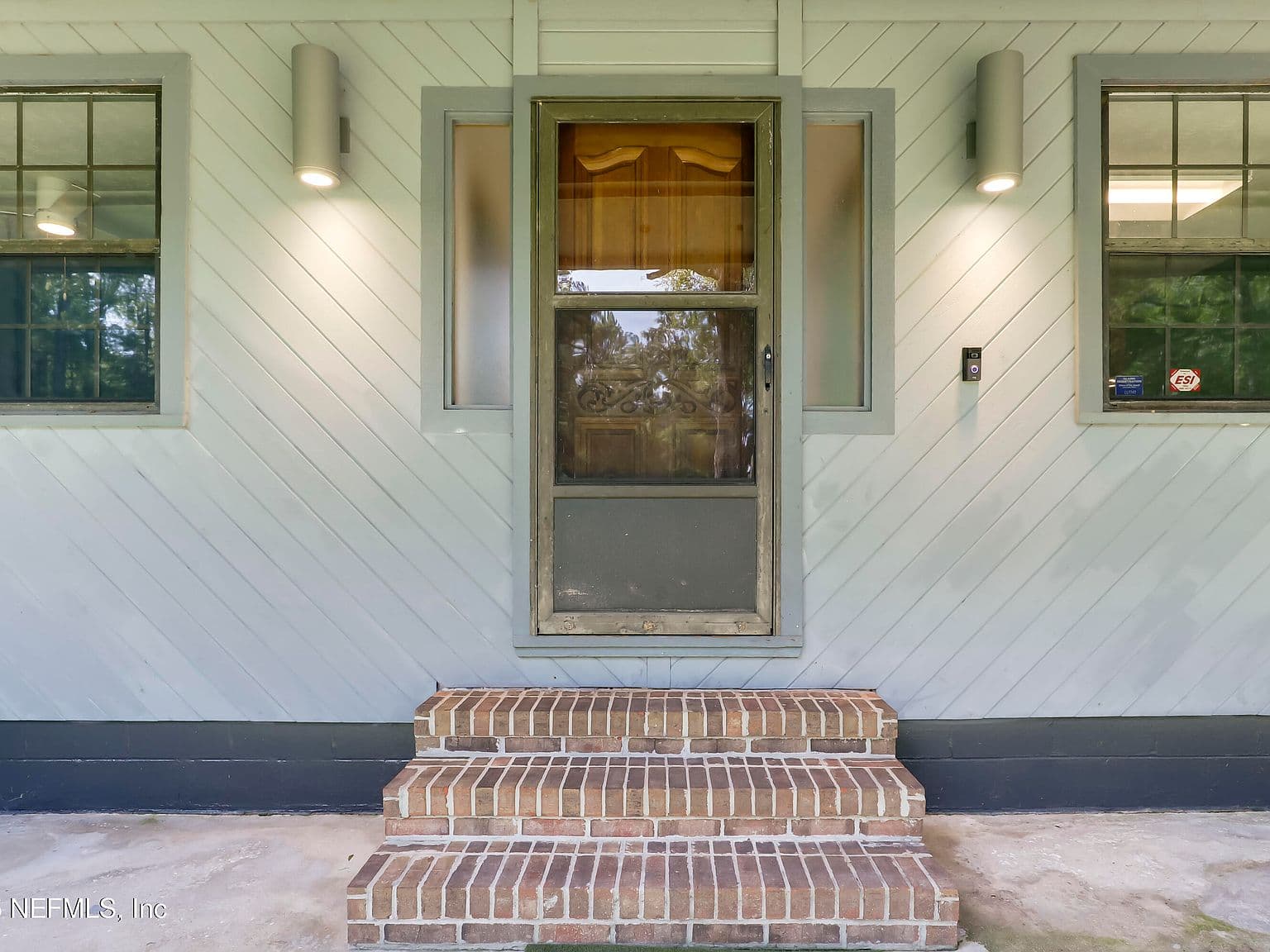 Worn front door and screen door