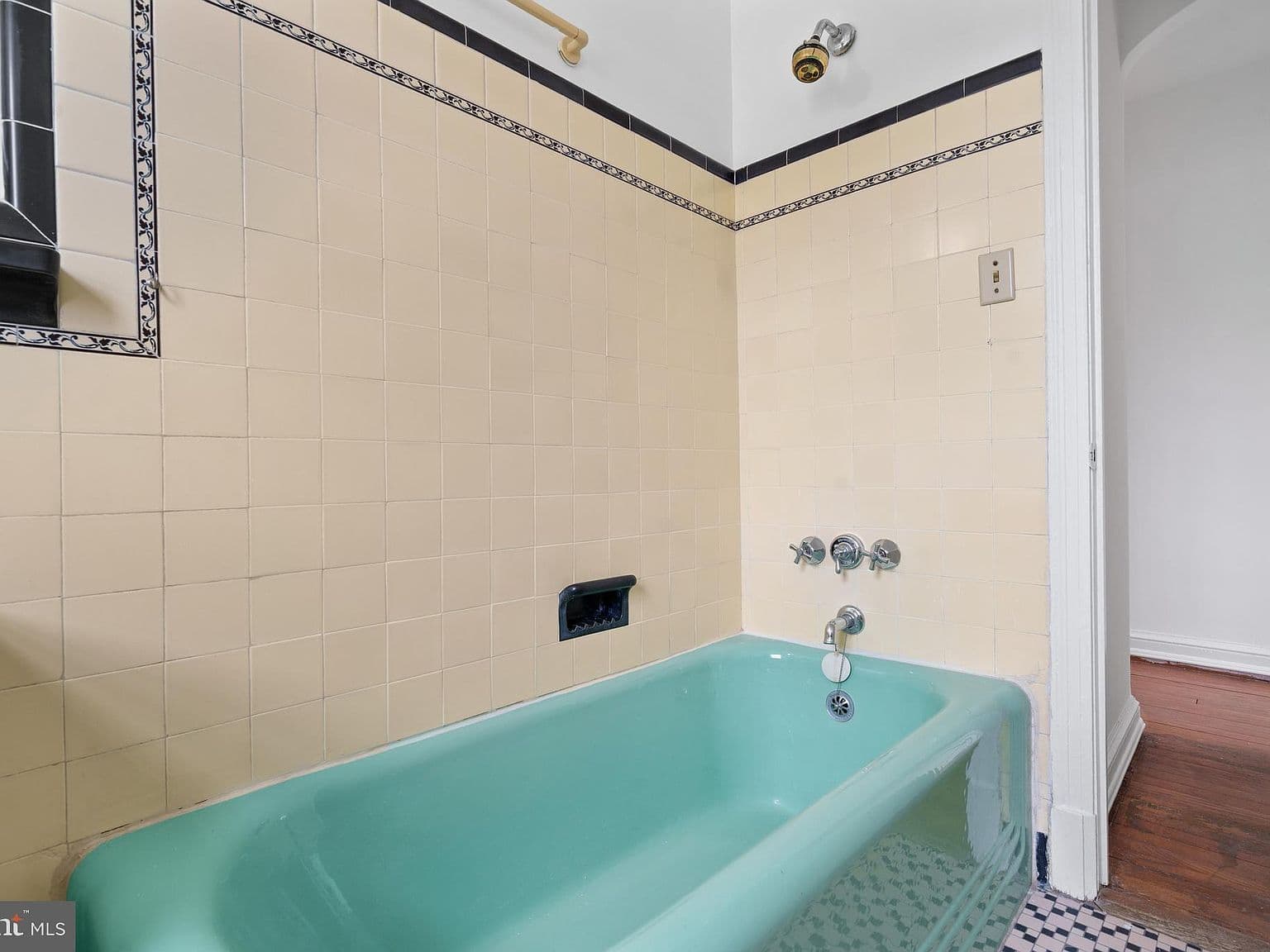 Outdated Bathroom Fixtures and Tile