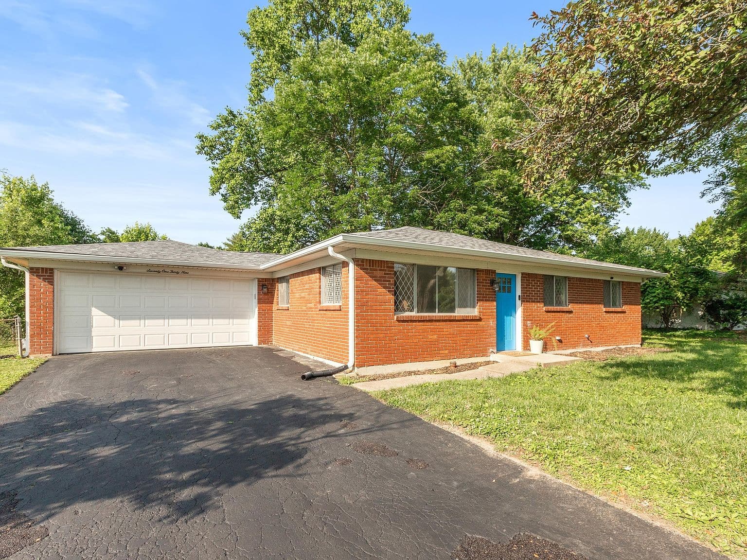 Cracked Asphalt Driveway