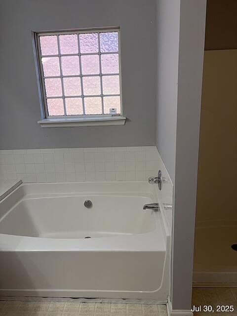 Outdated tub and tile surround