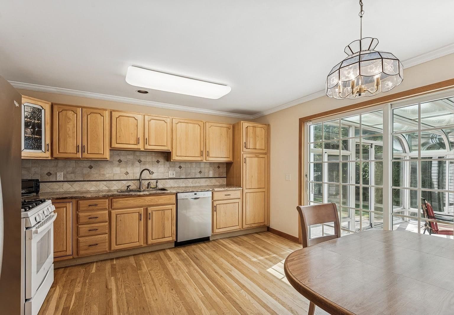 Dated Kitchen Cabinets and Backsplash