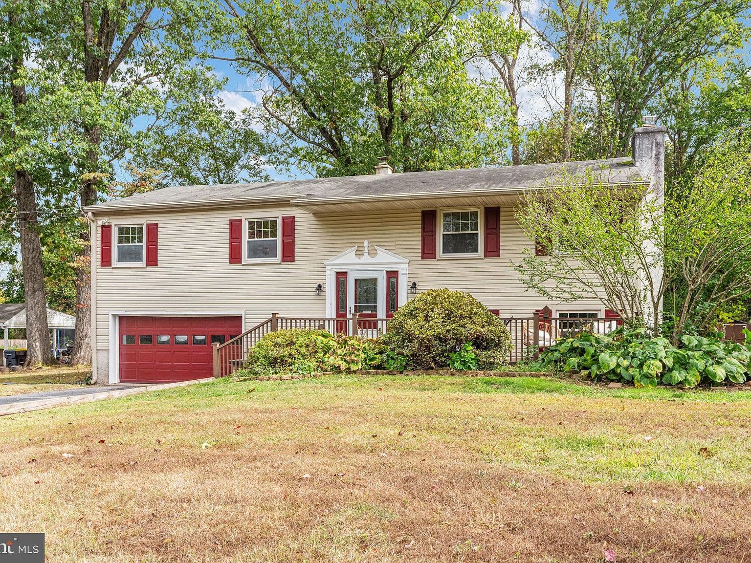 Red Garage Door and Shutters