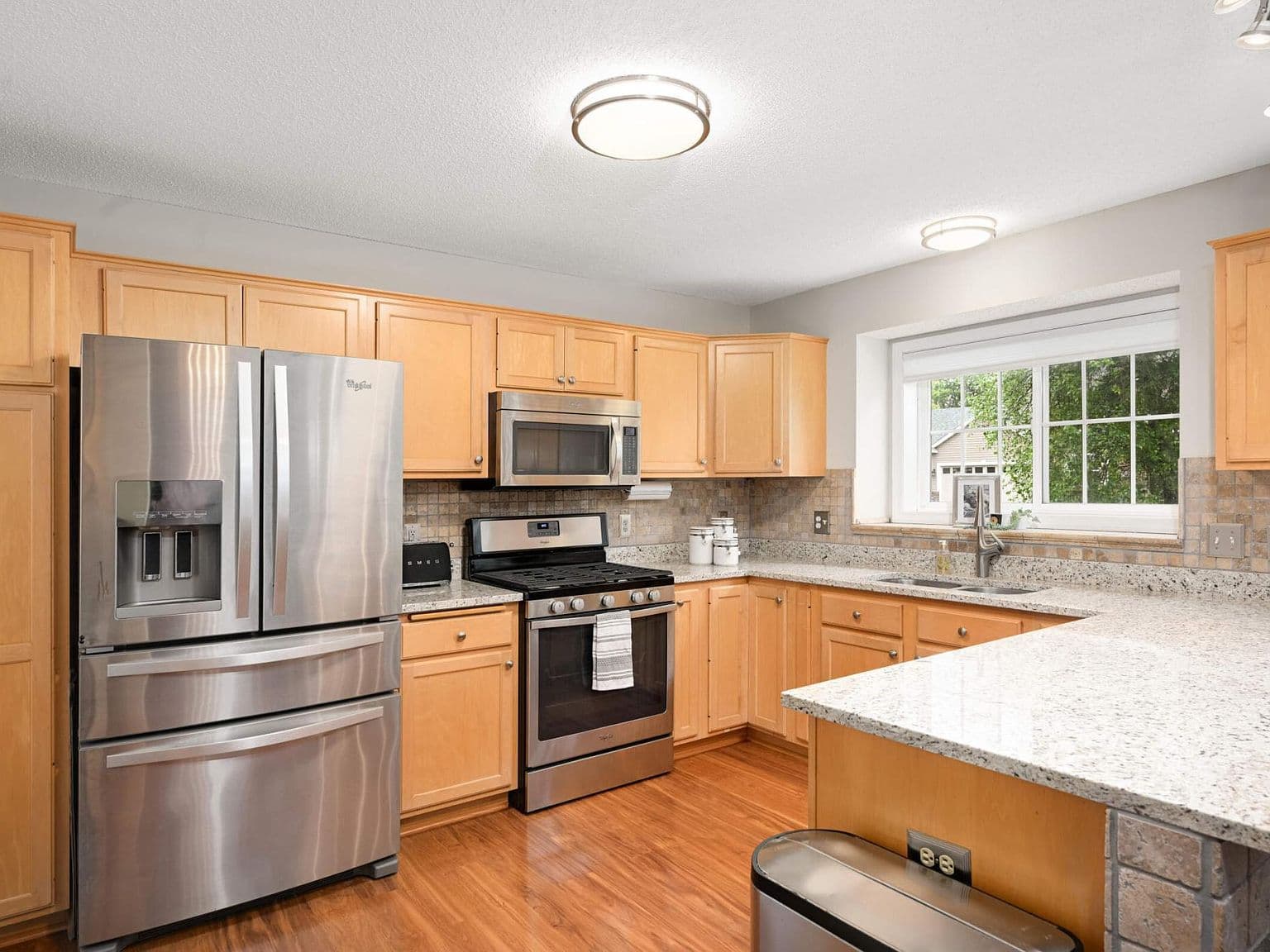 Dated Kitchen Cabinets and Backsplash